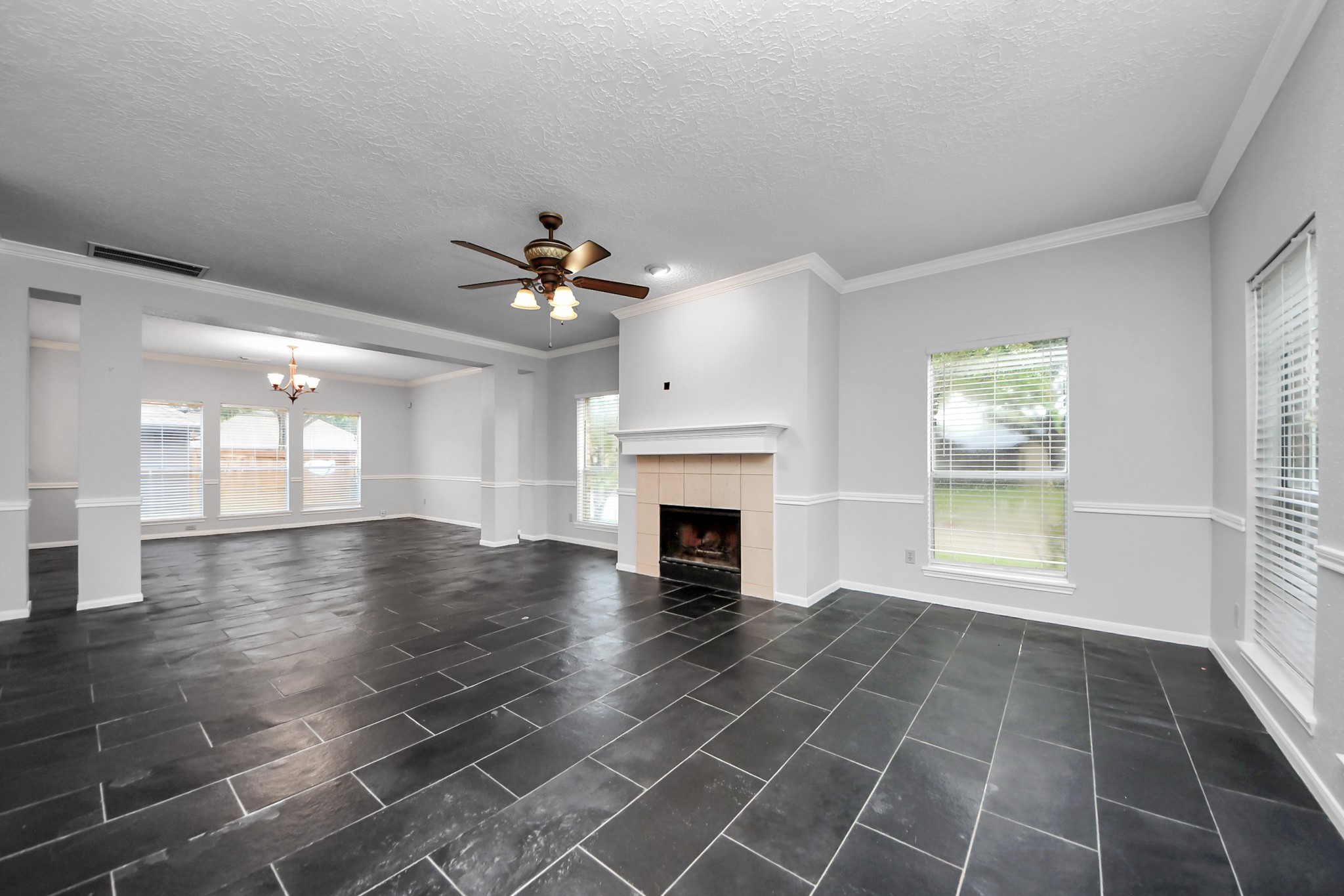2102 Gemini Avenue Houston, TX 77058 - Photo 4 of 40 an empty room with windows and fireplace