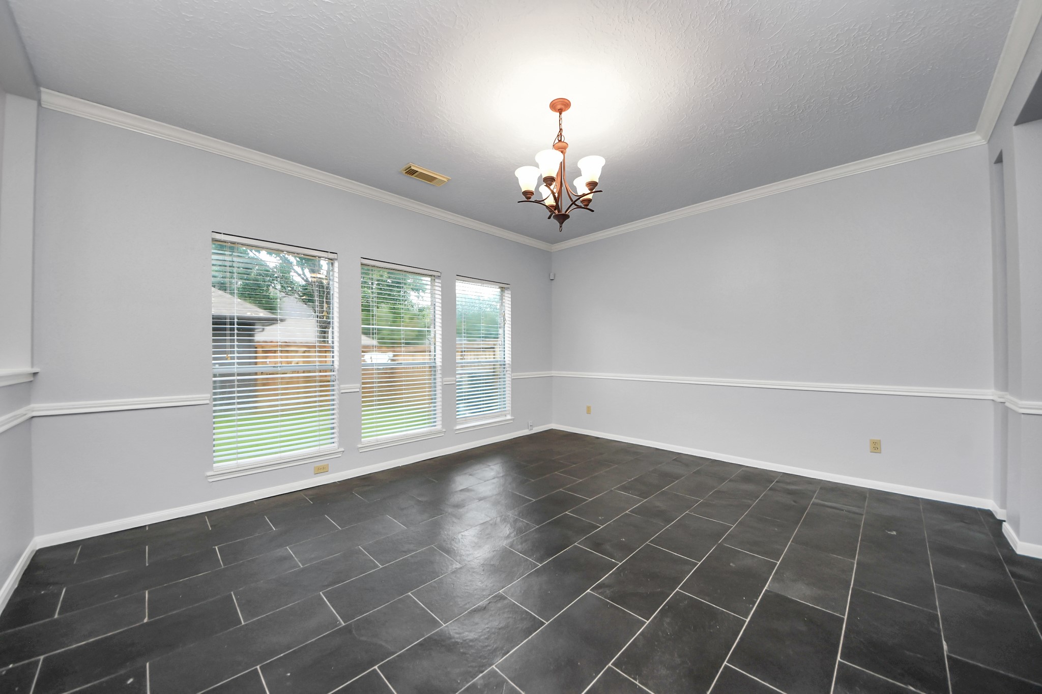 2102 Gemini Avenue Houston, TX 77058 - Photo 8 of 40 a view of an empty room with a window