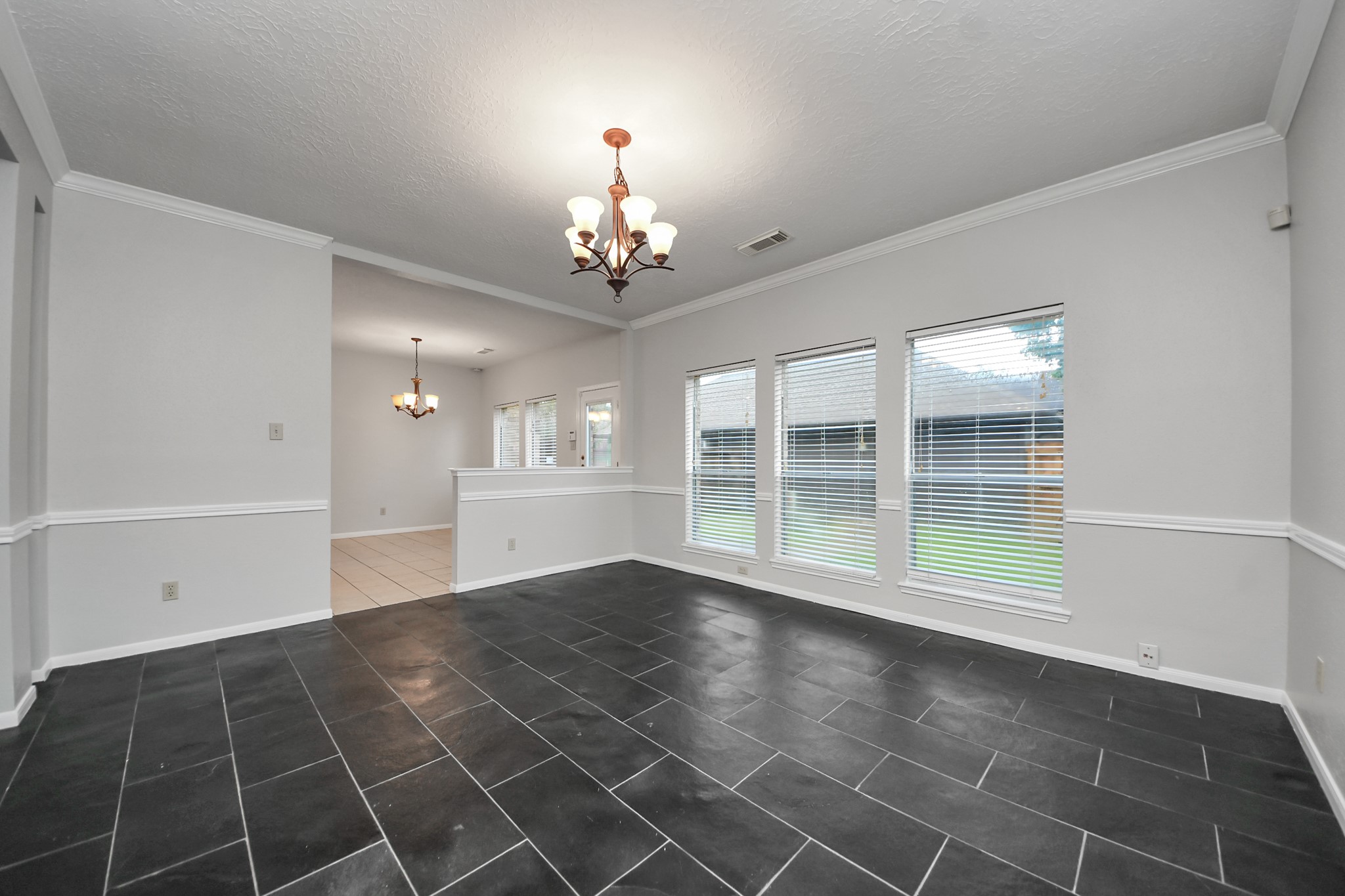 2102 Gemini Avenue Houston, TX 77058 - Photo 9 of 40 a view of an empty room with a window