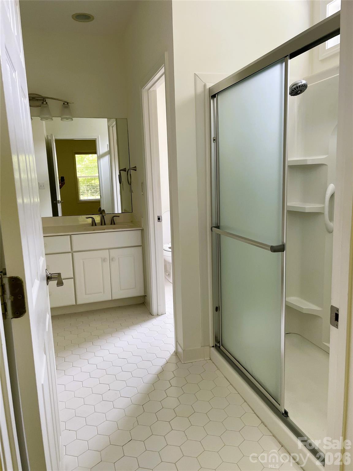 35 Sheffield Place Brevard, NC 28712 - Photo 23 of 38 a view of a bathroom with a bathtub and a sink