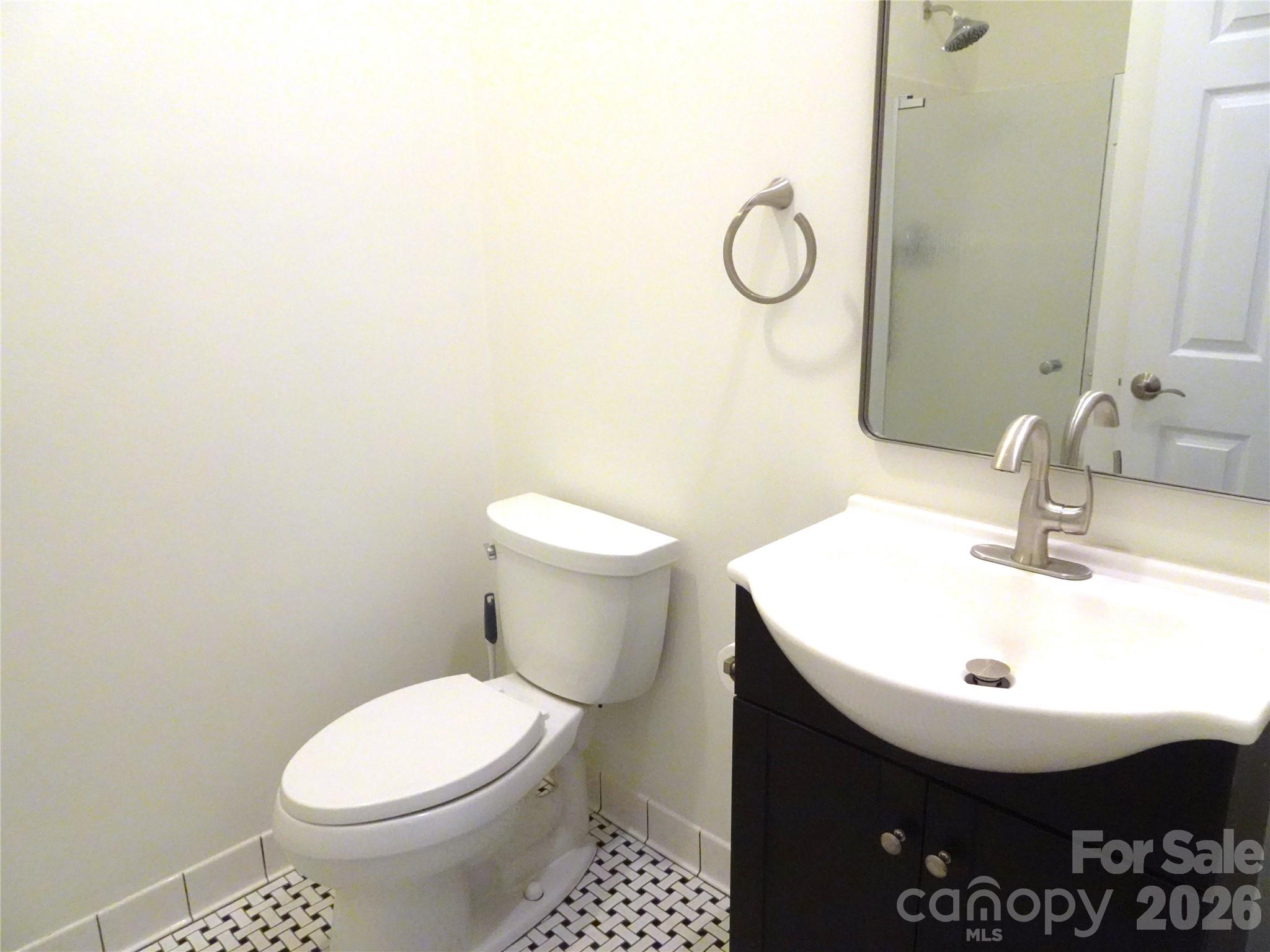 35 Sheffield Place Brevard, NC 28712 - Photo 29 of 38 a bathroom with a sink toilet and vanity