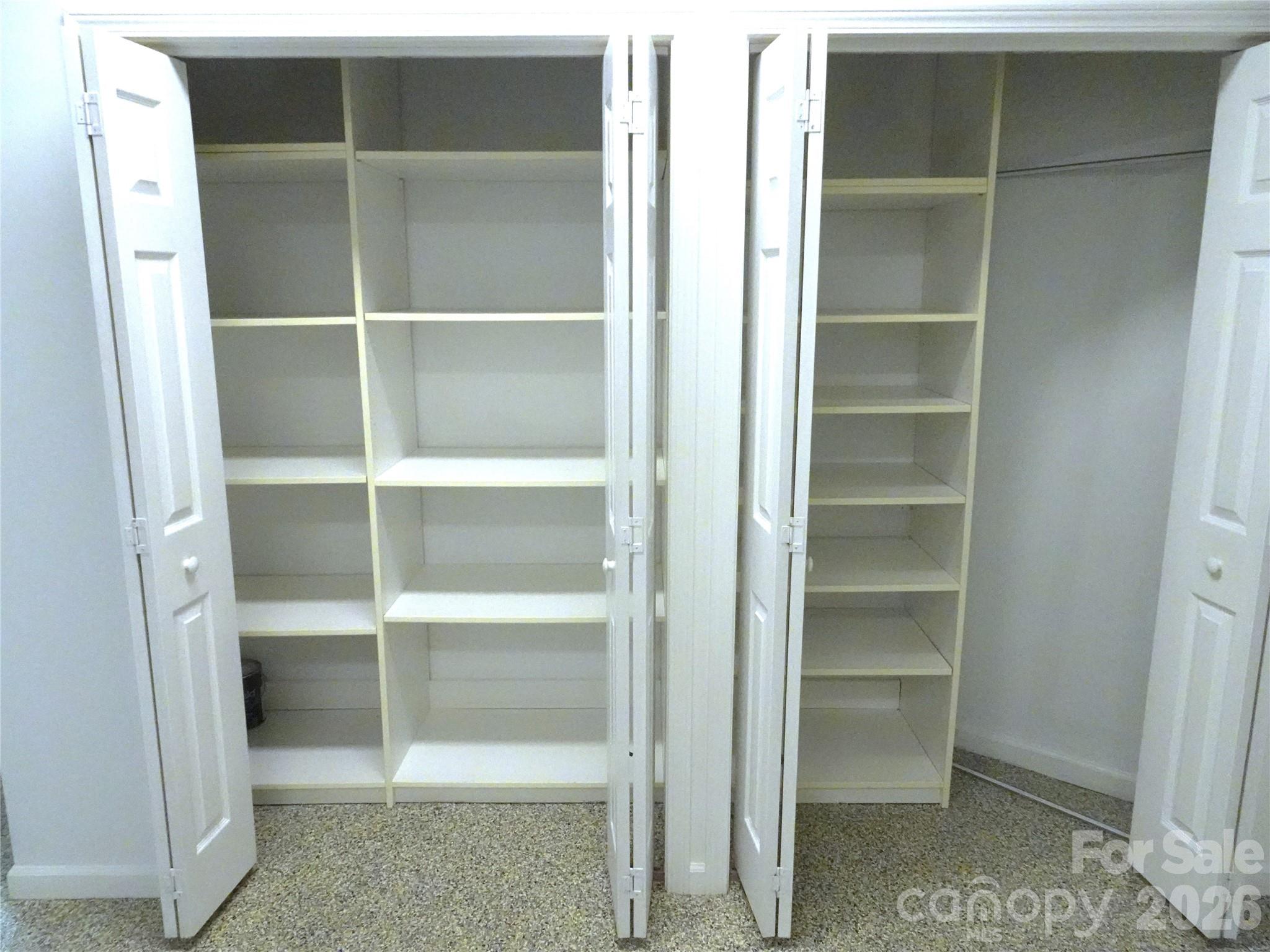 35 Sheffield Place Brevard, NC 28712 - Photo 34 of 38 a view of walk in closet with empty racks