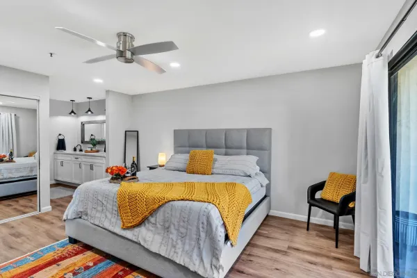 a bed room with a bed and furniture