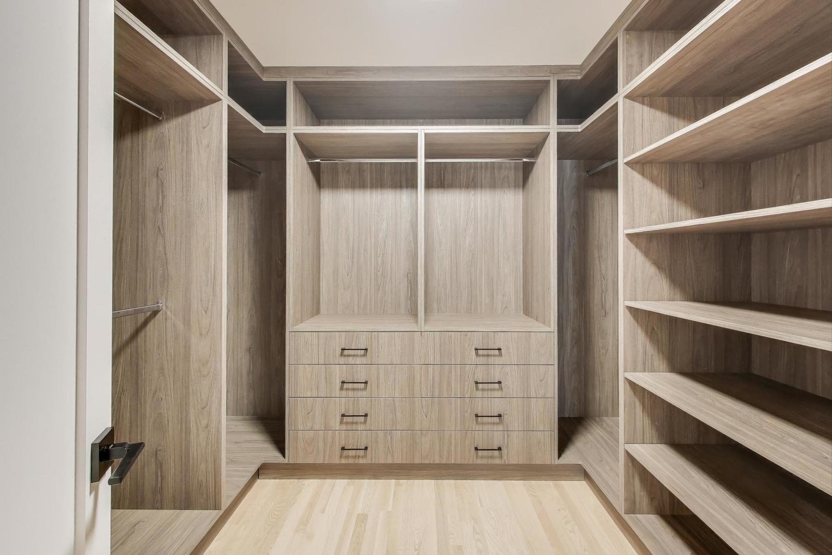 73 Augusta Drive Deerfield, IL 60015 - Photo 23 of 39 a view of walk in closet with empty racks