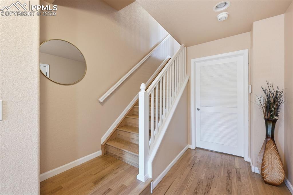 1095 Walters Point Monument, CO 80132 - Photo 5 of 27 Hardwood up the stairs