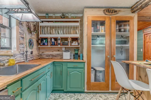 a very nice looking room with large windows