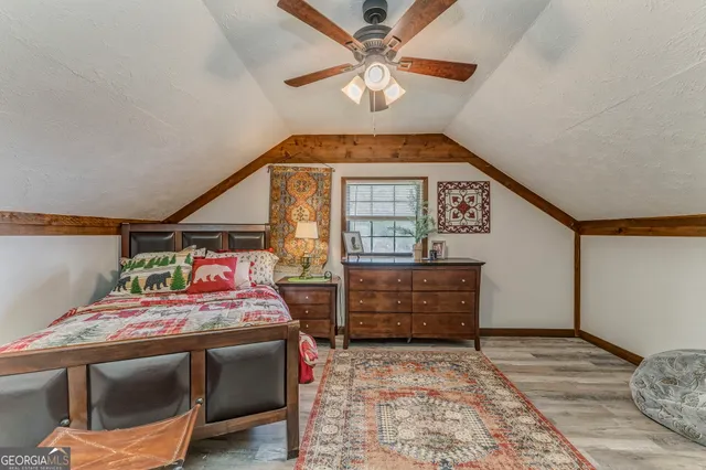 a bathroom with a toilet a sink and a shower