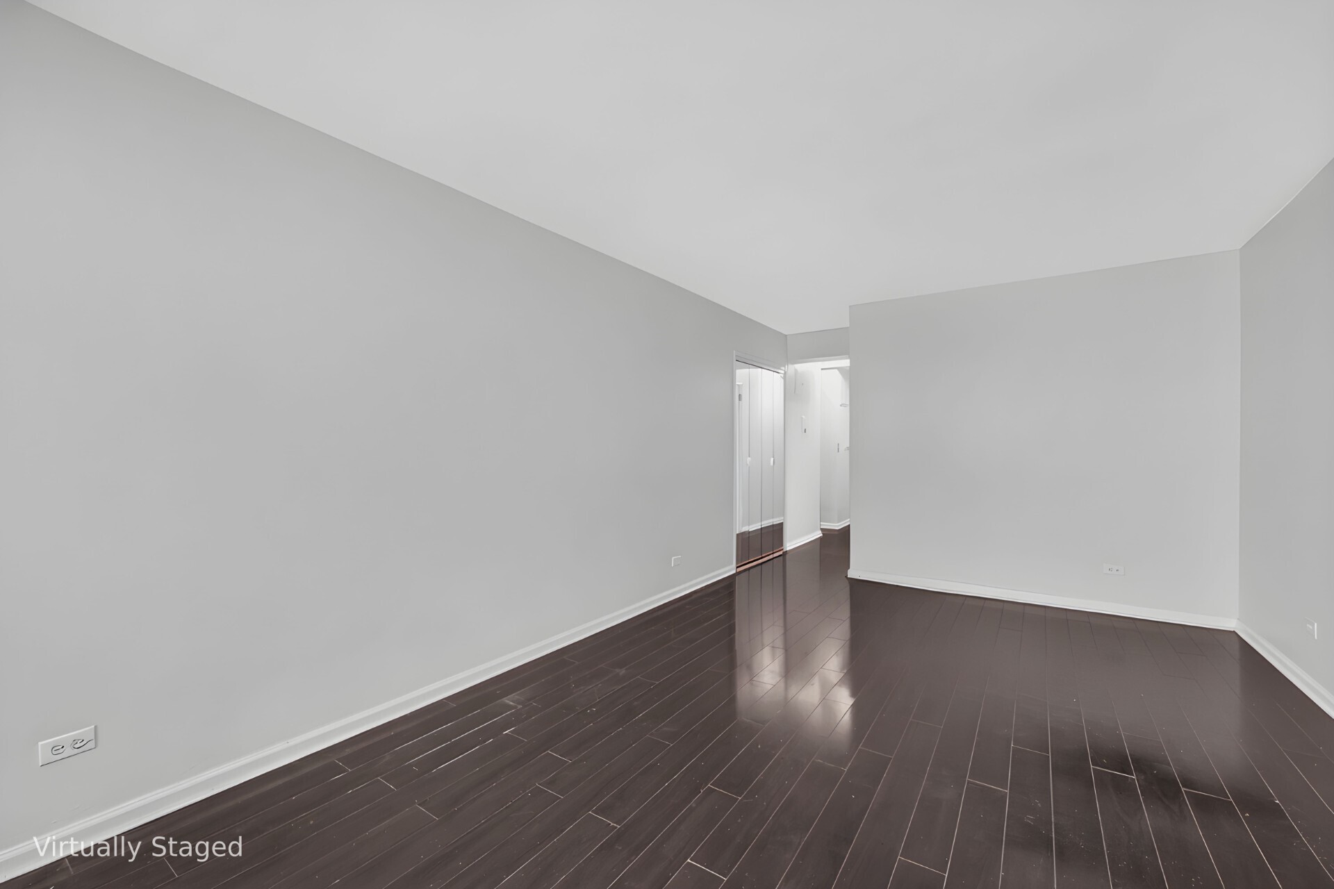 245 East 35th Street, Unit 9J Manhattan, NY 10016 - Photo 2 of 5 a view of an empty room and wooden floor