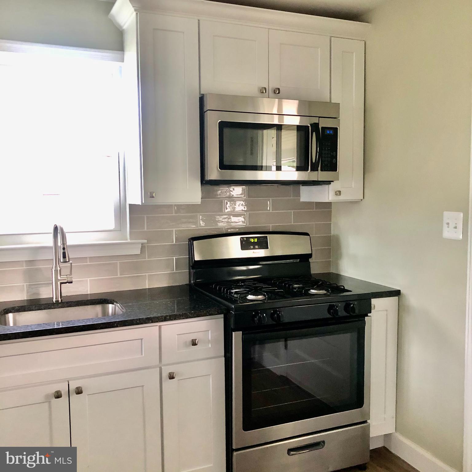 1237 Landover Road Baltimore, MD 21237 - Photo 8 of 25 new gas stainless steel stove