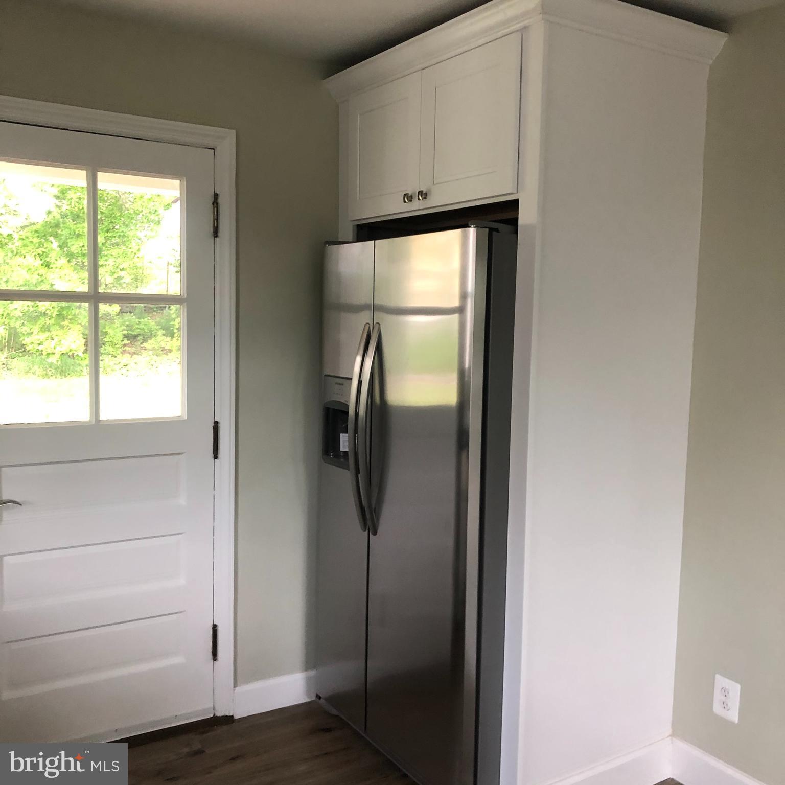 1237 Landover Road Baltimore, MD 21237 - Photo 10 of 25 stainless refrigerator with water and ice
