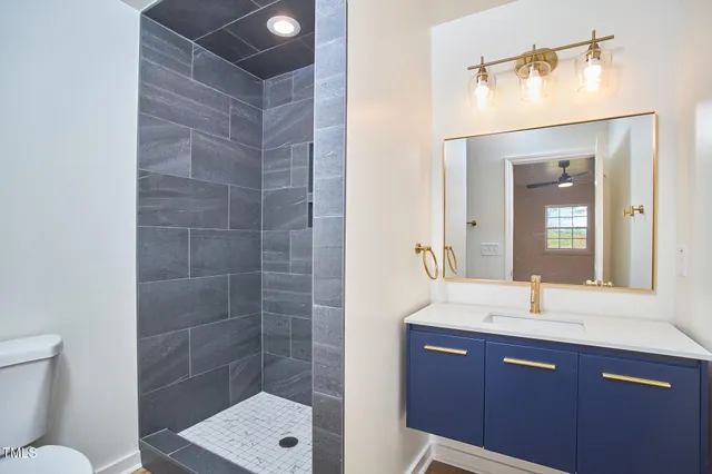 a kitchen with granite countertop a sink and a window