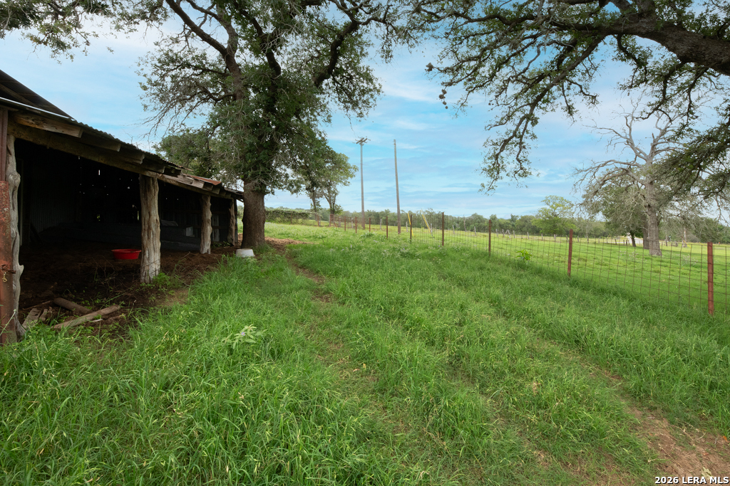 104 Longhorn Road Stockdale, TX 78160 - Photo 26 of 47 a view of an outdoor space and yard