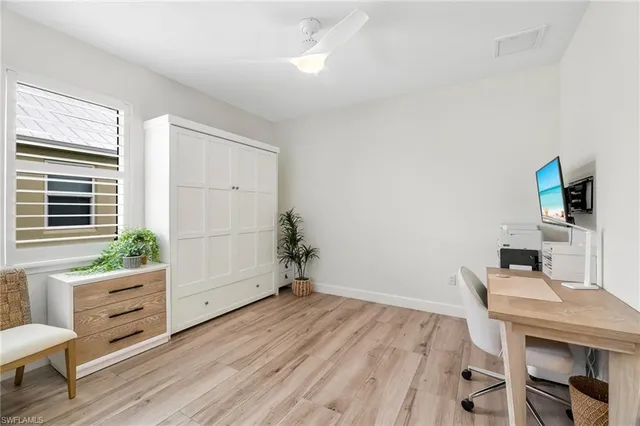 a room with furniture and a window