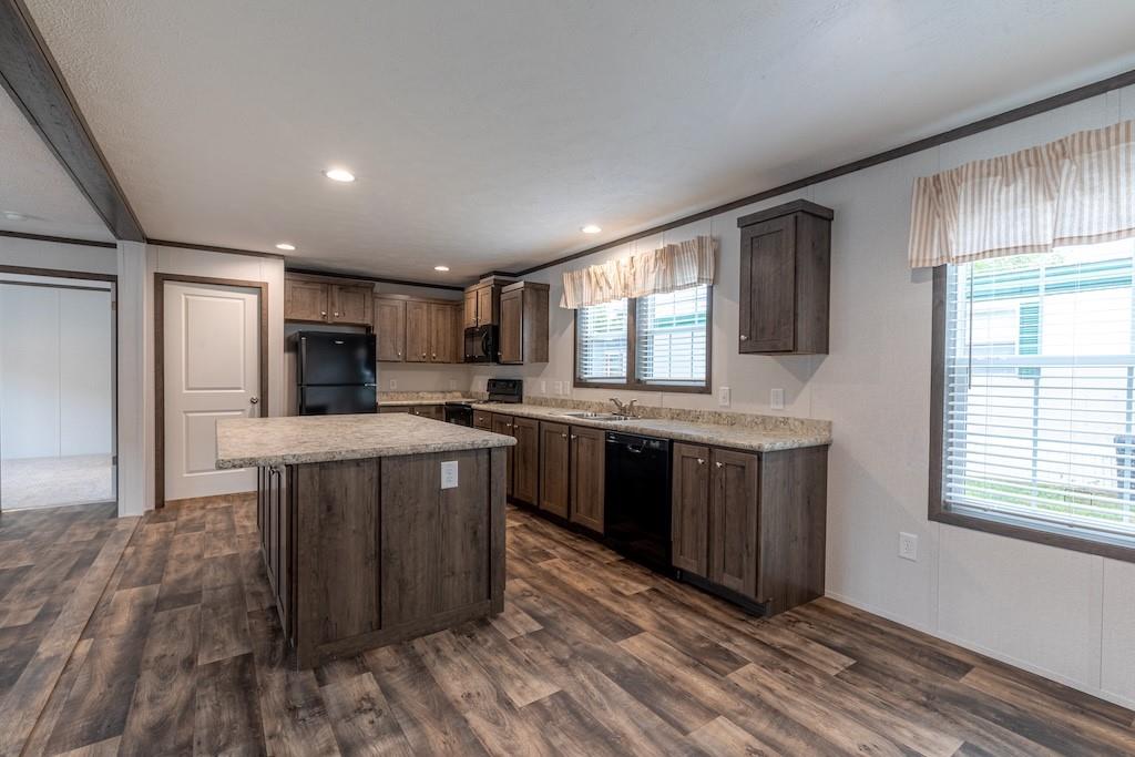 1352 Hilltop Drive Bulger, PA 15019 - Photo 11 of 23 a kitchen with stainless steel appliances granite countertop a stove a sink dishwasher and a refrigerator with wooden floor