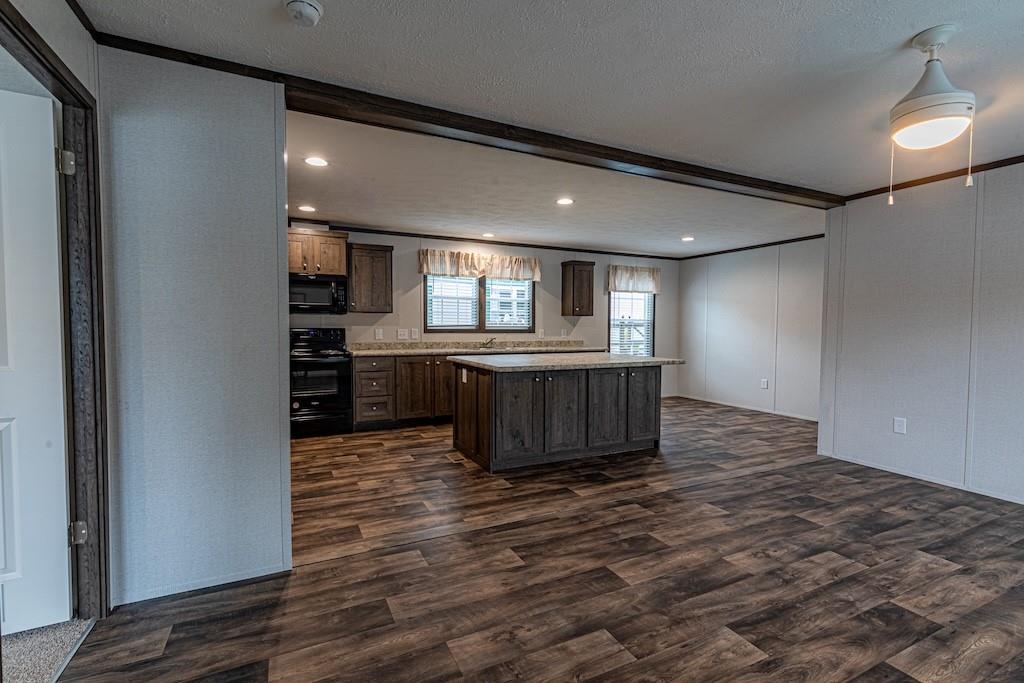 1352 Hilltop Drive Bulger, PA 15019 - Photo 4 of 23 a view of kitchen and empty room with wooden floor