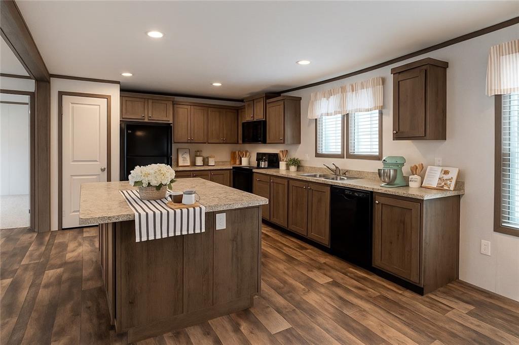 1352 Hilltop Drive Bulger, PA 15019 - Photo 10 of 23 a kitchen with kitchen island granite countertop wooden floors granite top and stainless steel appliances