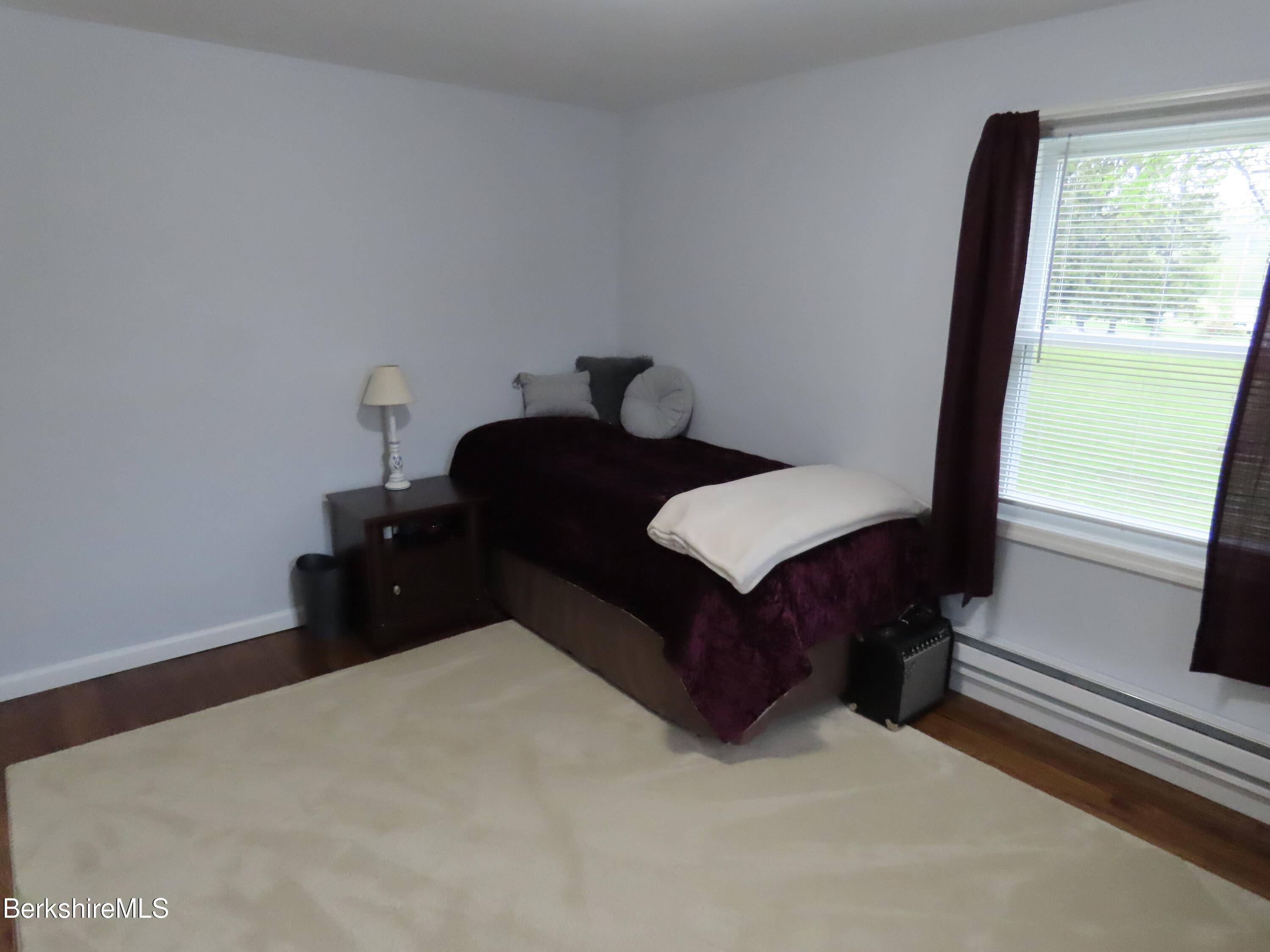 1580 Main Road Stamford, VT 05352 - Photo 17 of 39 a living room with furniture