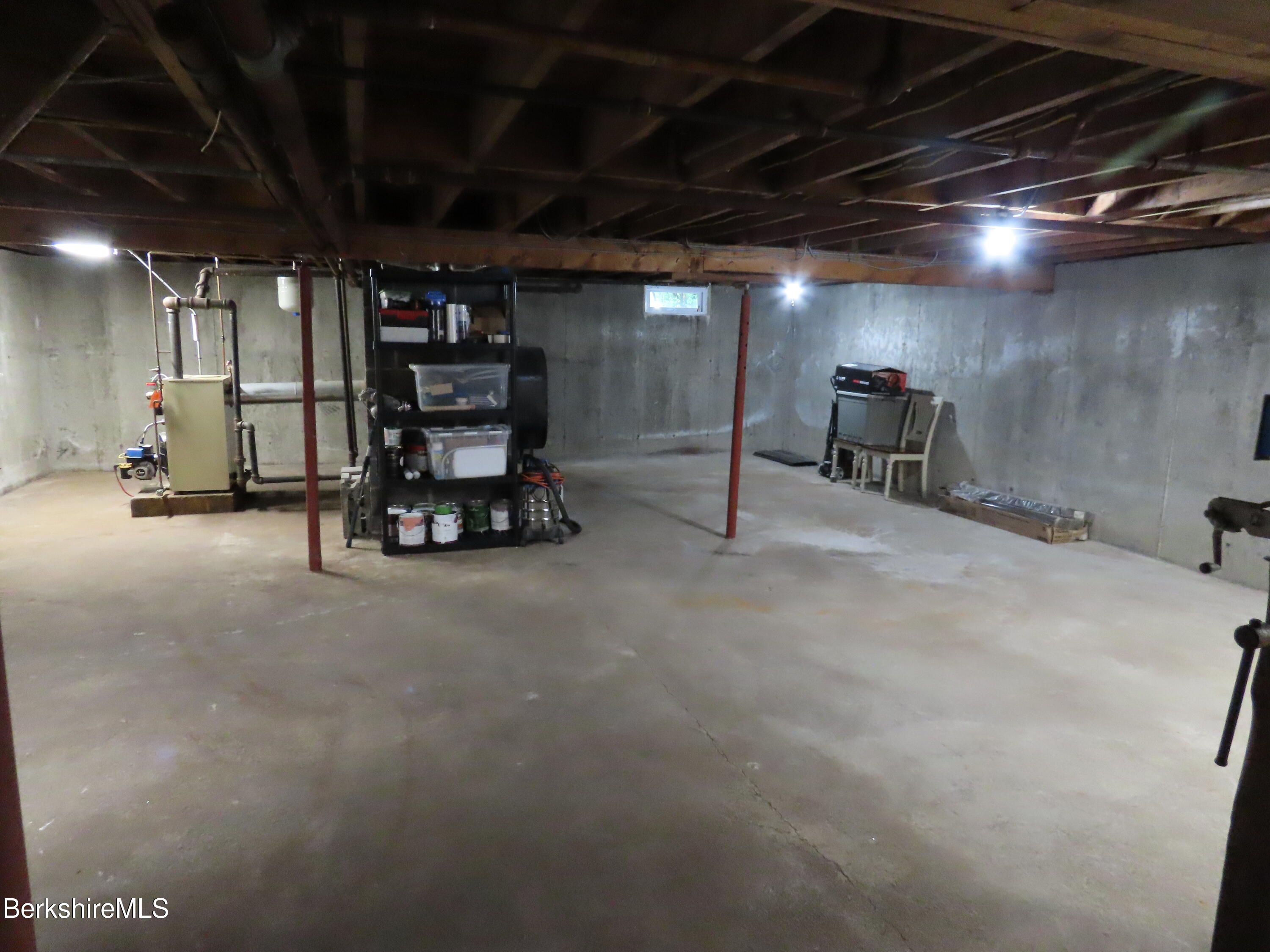 1580 Main Road Stamford, VT 05352 - Photo 27 of 39 a view of a empty room with gym equipment