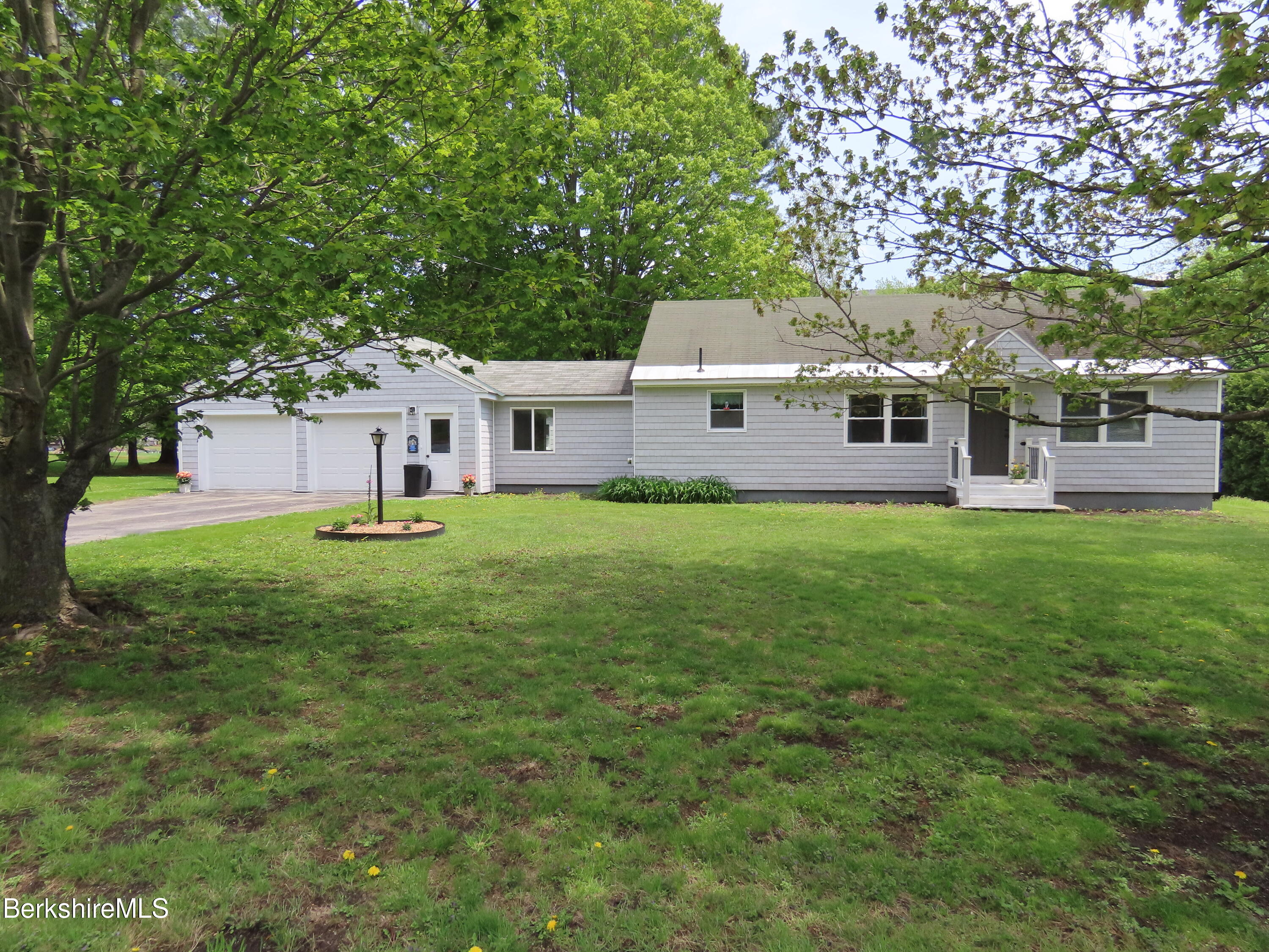 1580 Main Road Stamford, VT 05352 - Photo 29 of 39 front view of a house with a yard