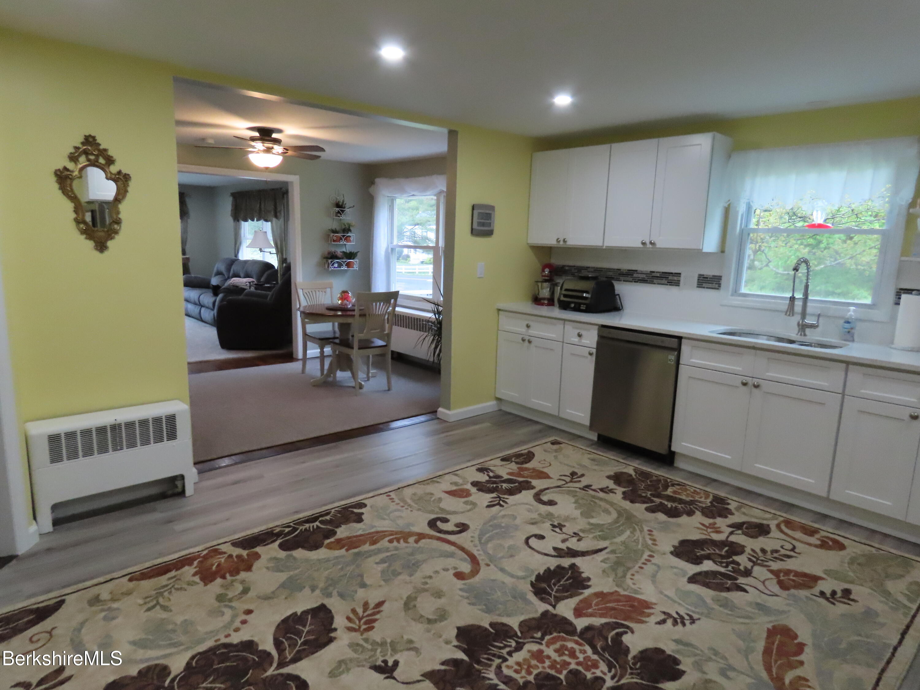 1580 Main Road Stamford, VT 05352 - Photo 6 of 39 a kitchen with a sink and cabinets