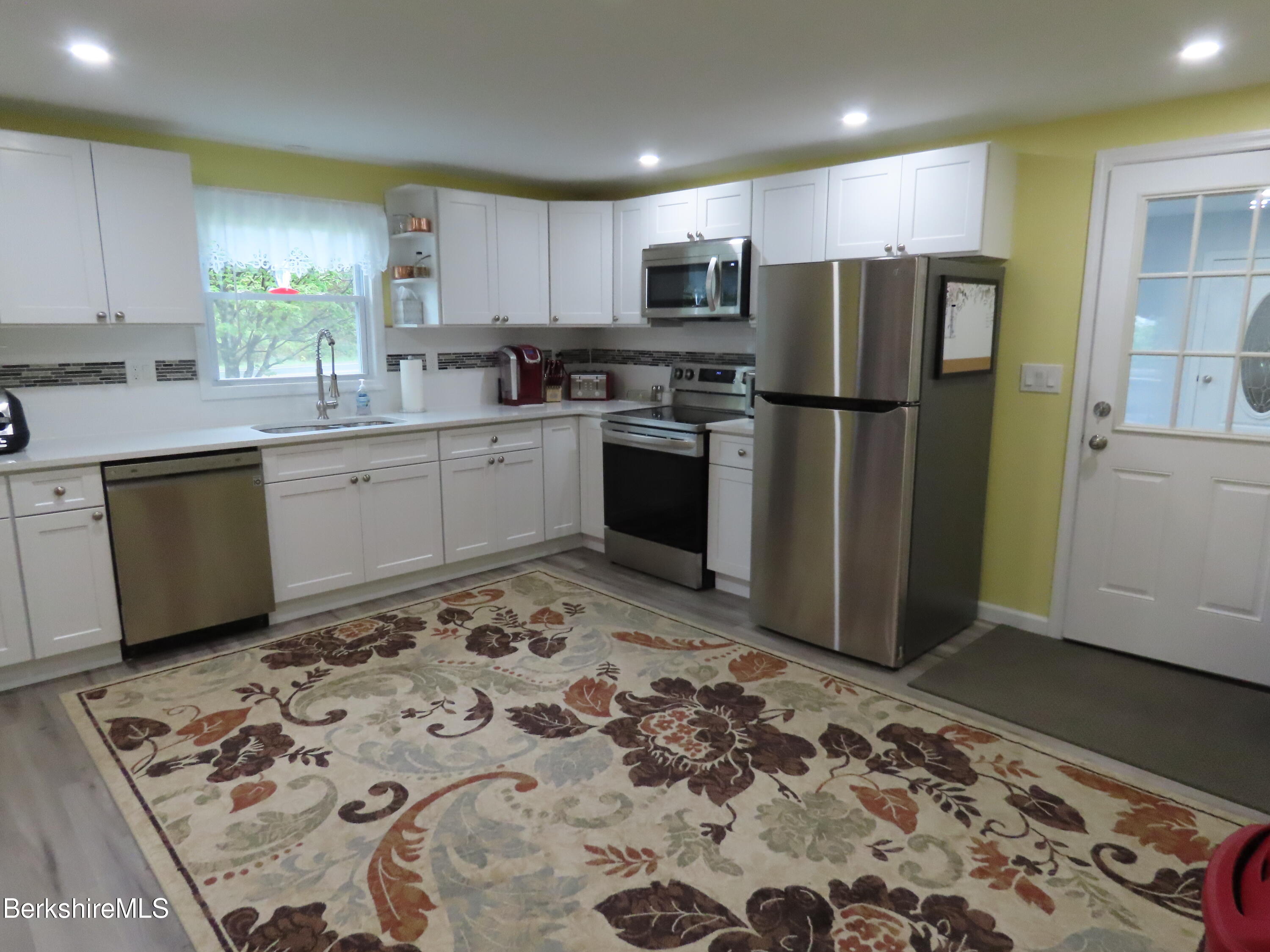 1580 Main Road Stamford, VT 05352 - Photo 7 of 39 a kitchen with a refrigerator sink and microwave