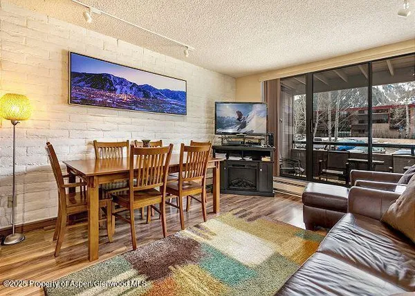 a view of a dining room with furniture