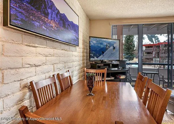 a outdoor living space with furniture and wooden floor