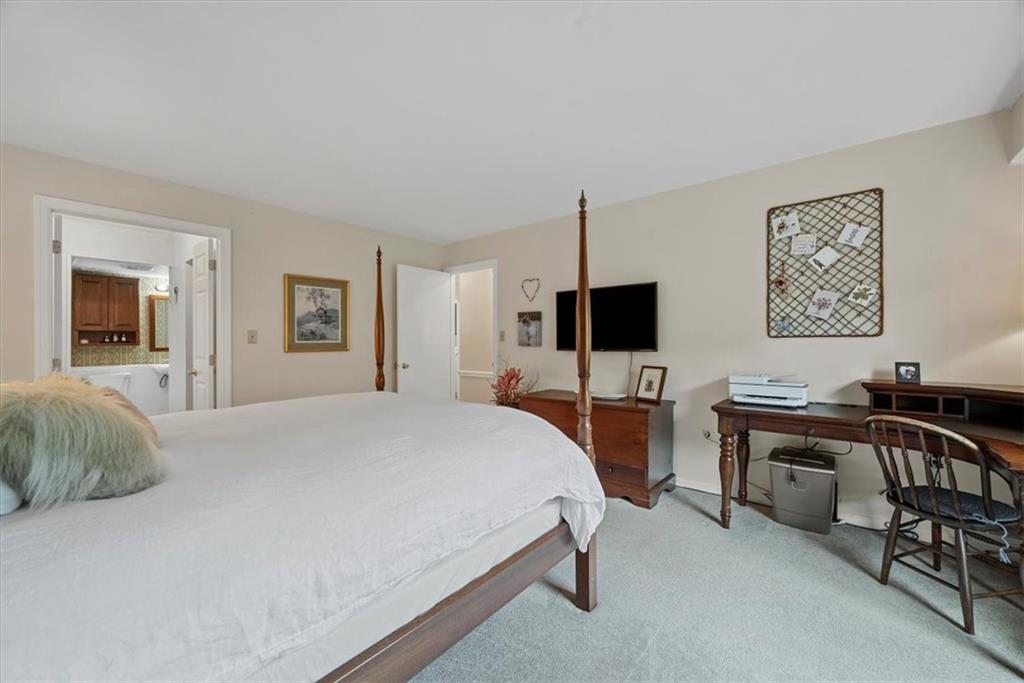 300 Fox Chapel Road, Unit 612 Pittsburgh, PA 15238 - Photo 20 of 39 Sunny bedroom with ensuite bath.