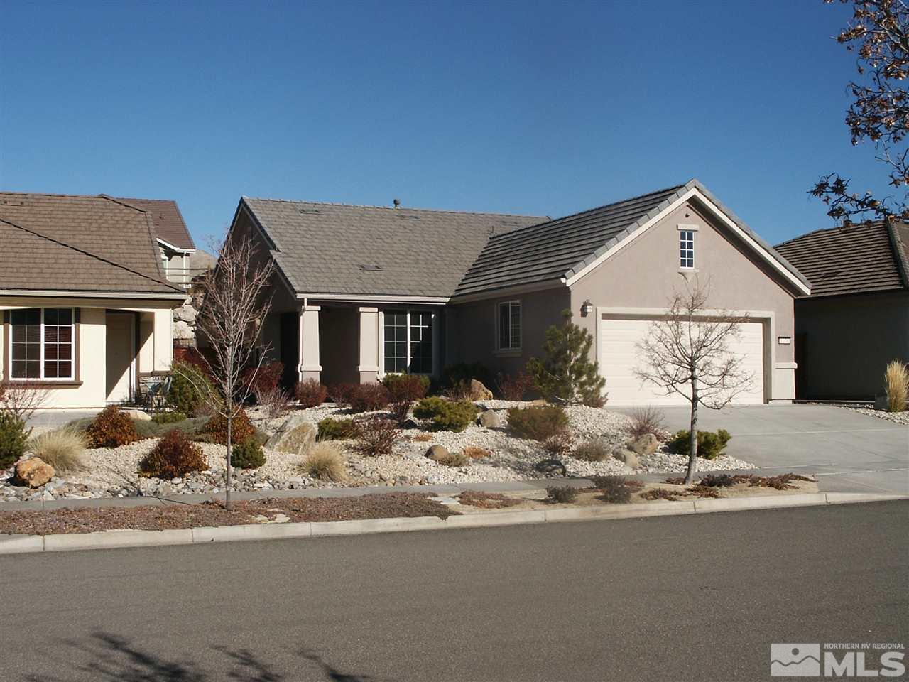 1170 Meridian Ranch Drive Reno, NV 89523 - Photo 1 of 1 a front view of a house with yard and parking