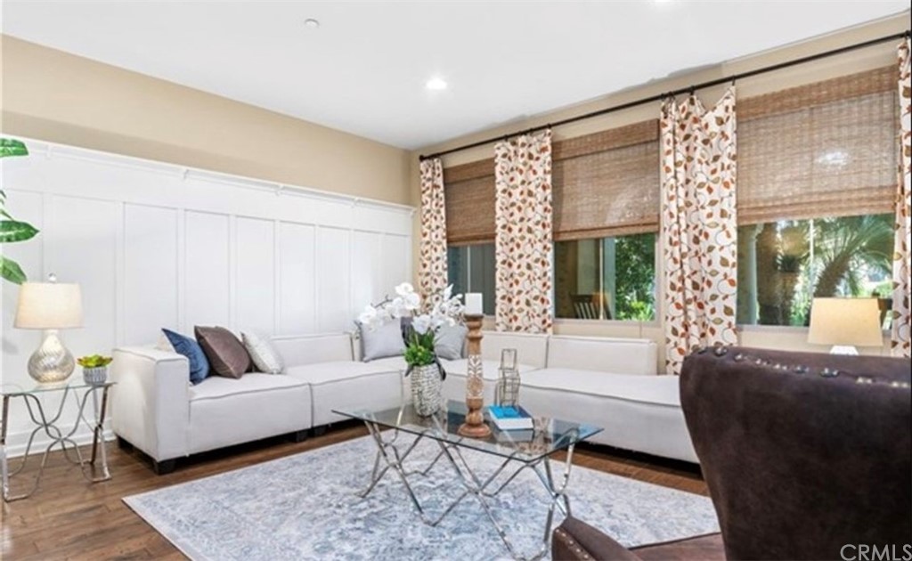 42 City Stroll Irvine, CA 92620 - Photo 3 of 3 a living room with furniture and a large window