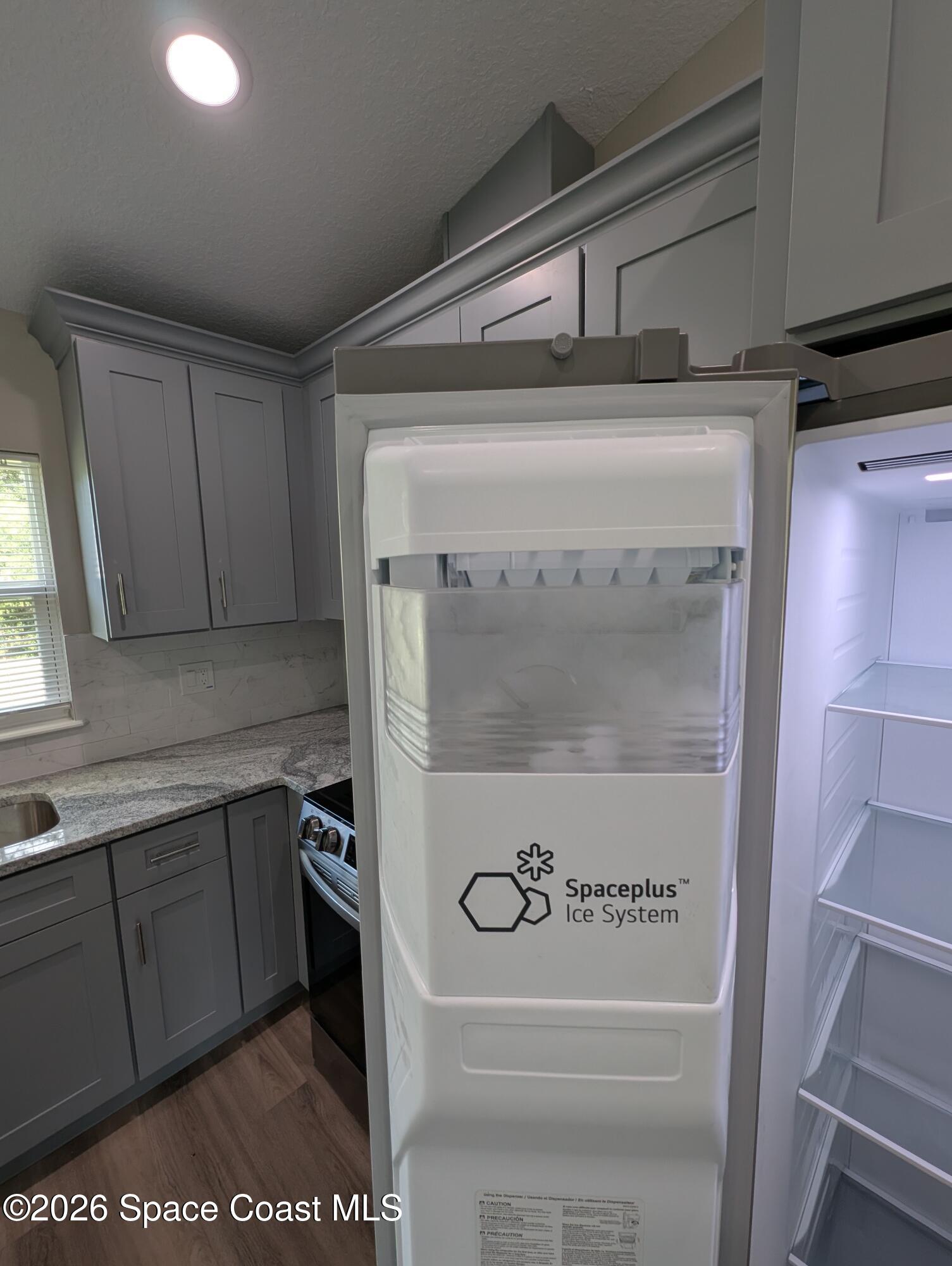 1356 Torgerson Road Southeast Palm Bay, FL 32909 - Photo 30 of 46 Icemaker on the door