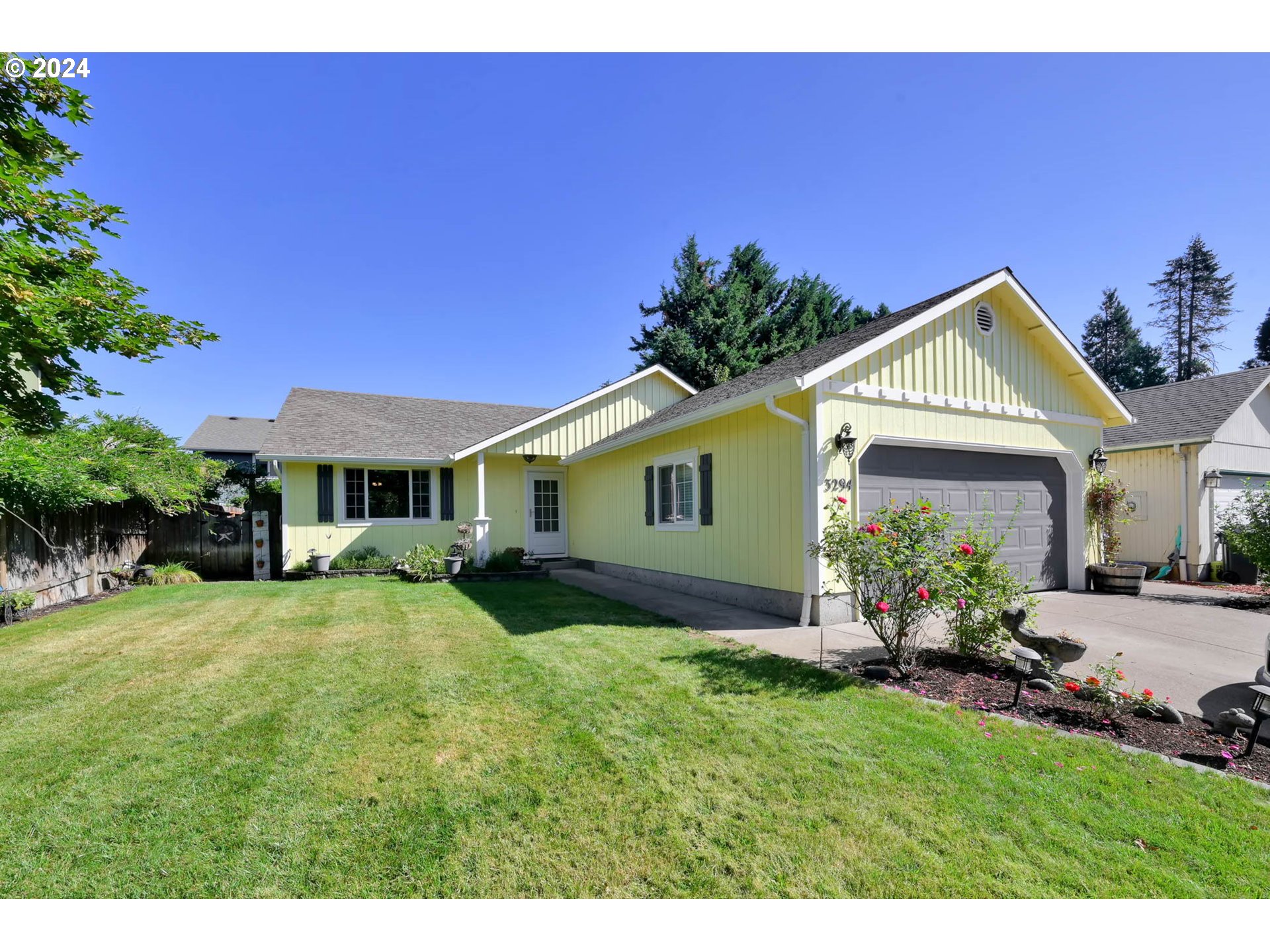3294 Pinyon Street Springfield, OR 97478 - Photo 2 of 29 a view of an house with backyard space and garden