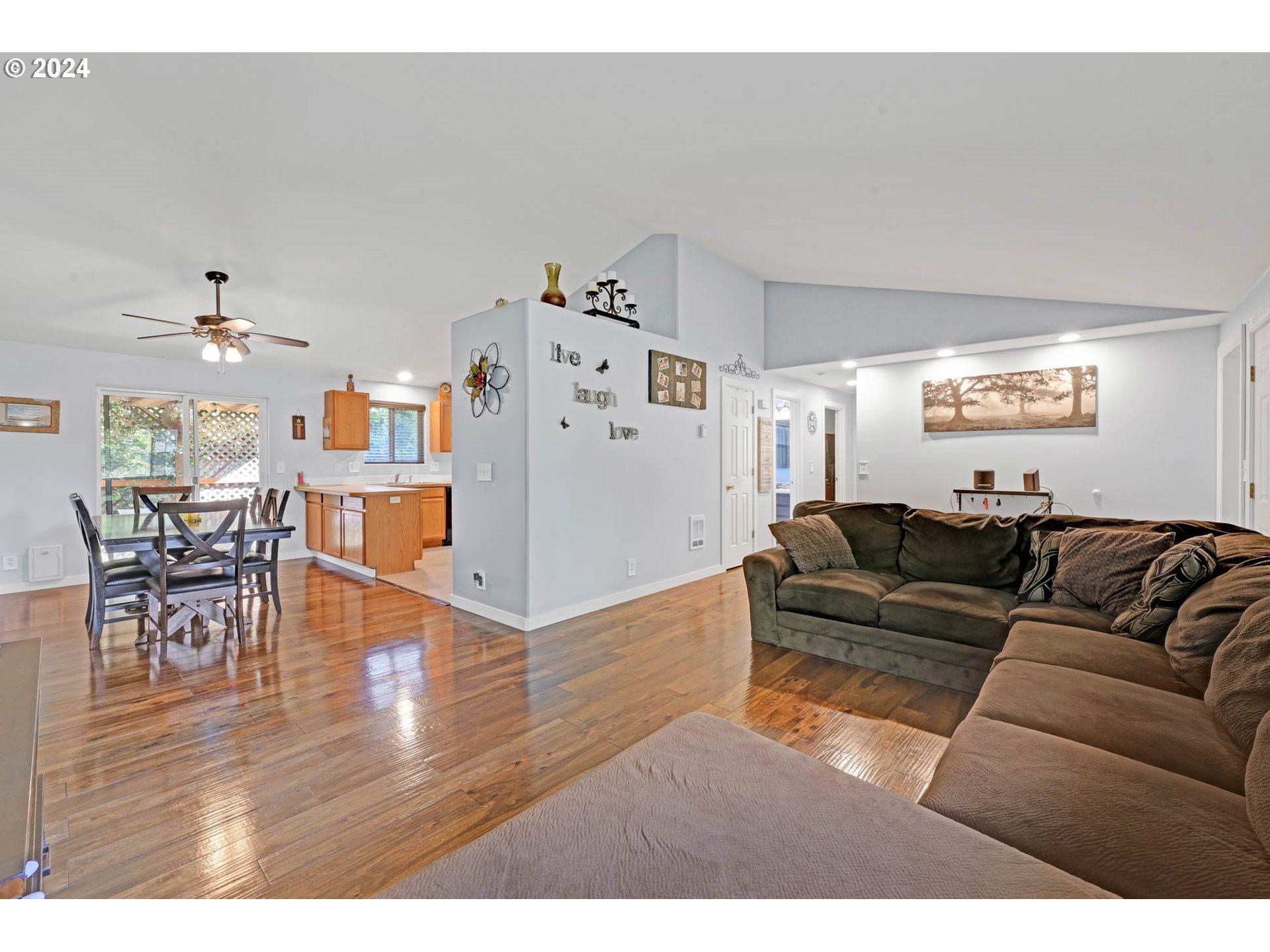 3294 Pinyon Street Springfield, OR 97478 - Photo 4 of 29 a living room with furniture and a wooden floor