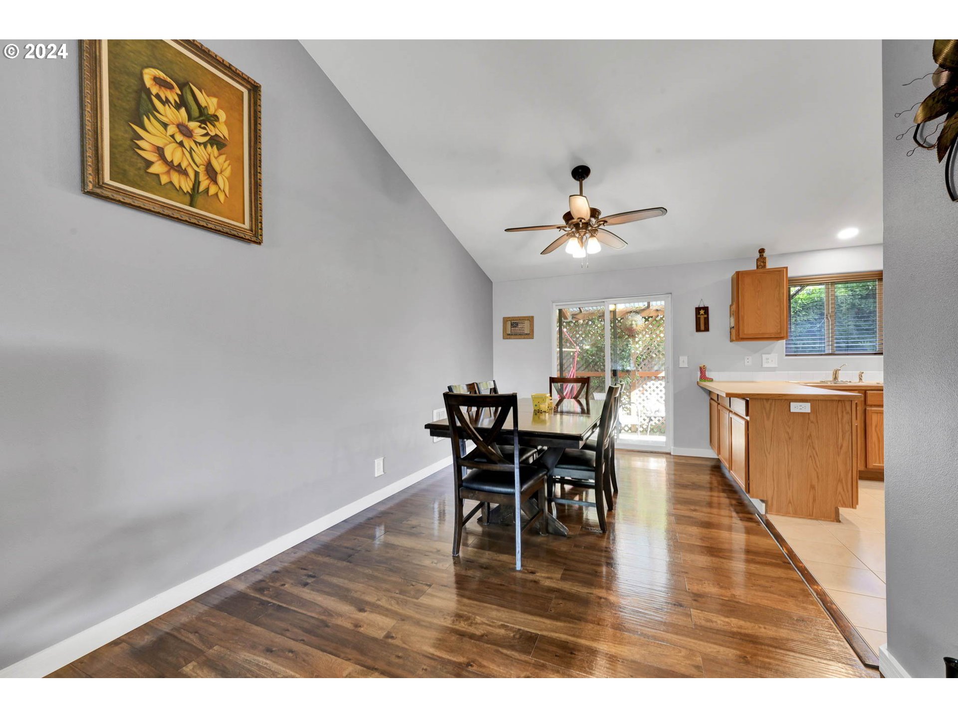 3294 Pinyon Street Springfield, OR 97478 - Photo 6 of 29 a view of a dining room with furniture and wooden floor