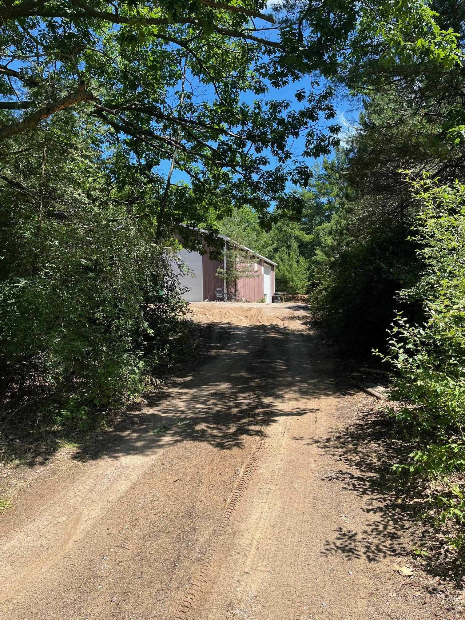 8056 Skegemog Point Road Williamsburg, MI 49690 - Photo 3 of 30 1924396-8b1f4188-e72f-46e3-9441-ebe8cb326fc1.JPG