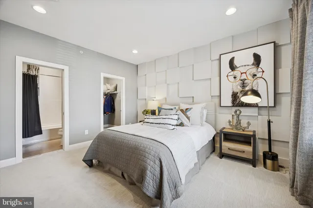 a bathroom with a double vanity sink and mirror