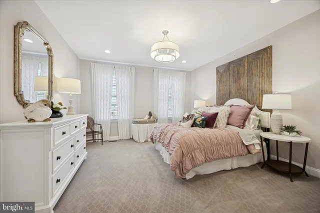 a bathroom with a shower curtain and a sink
