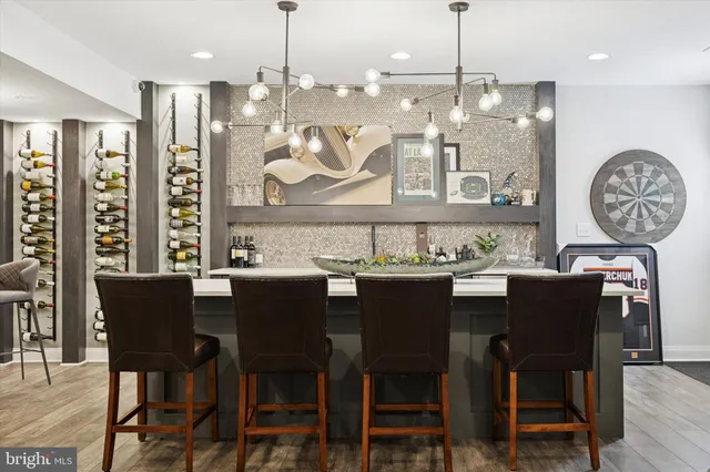 a view of a livingroom with furniture and wooden floor