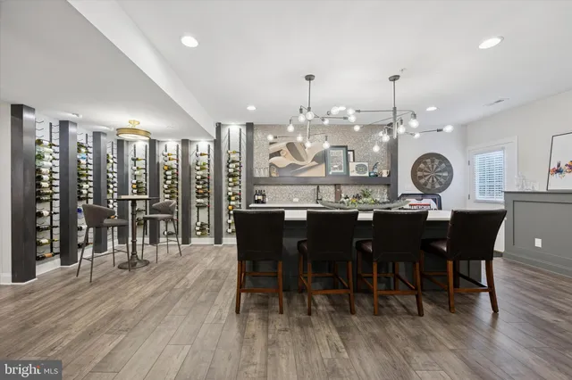 a view of a room with furniture and window