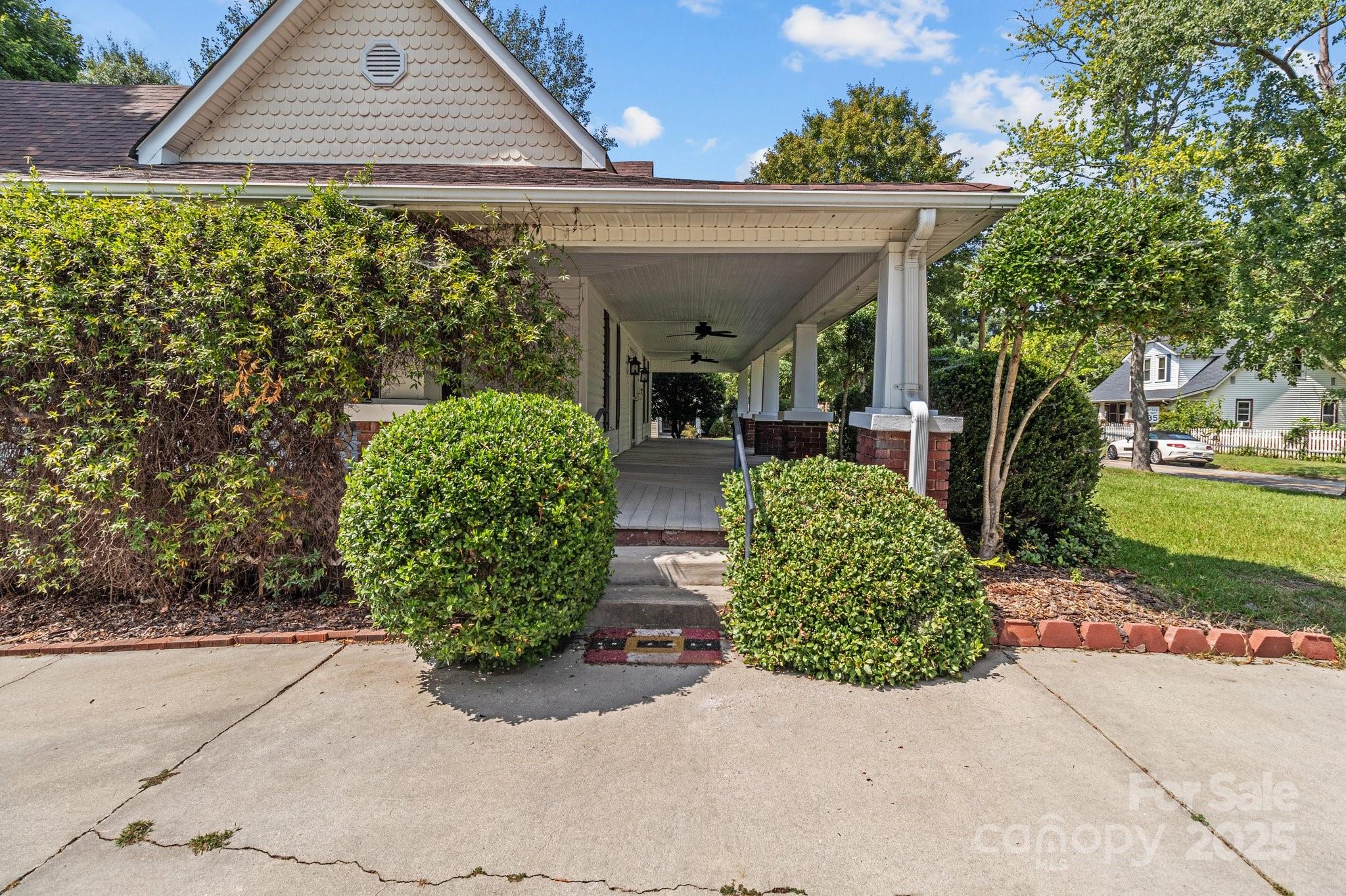 405 7th Street Spencer, NC 28159 - Photo 28 of 39 front view of a house with a yard