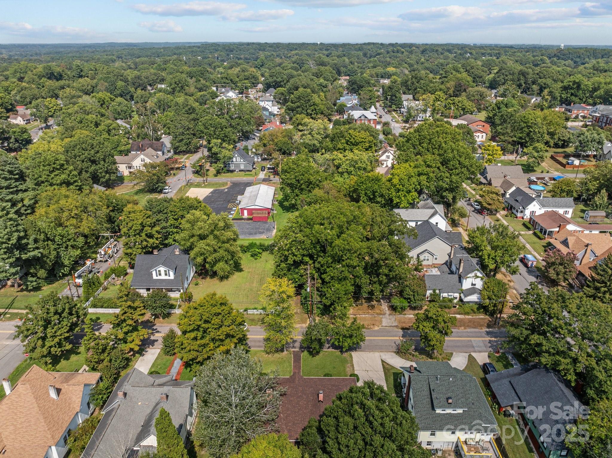 405 7th Street Spencer, NC 28159 - Photo 31 of 39 an aerial view of residential houses with outdoor space and trees