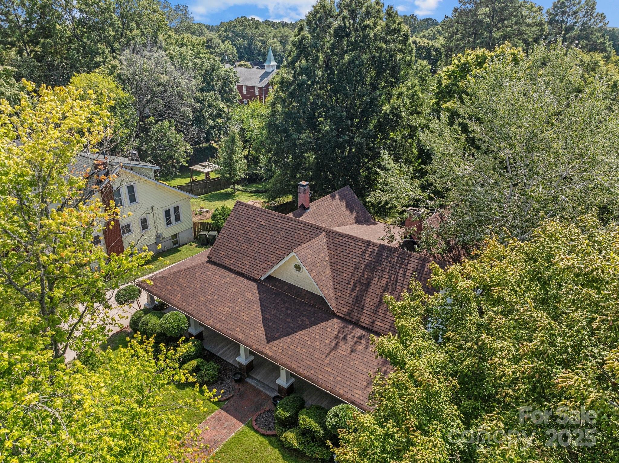 405 7th Street Spencer, NC 28159 - Photo 34 of 39 an aerial view of a house with swimming pool and garden