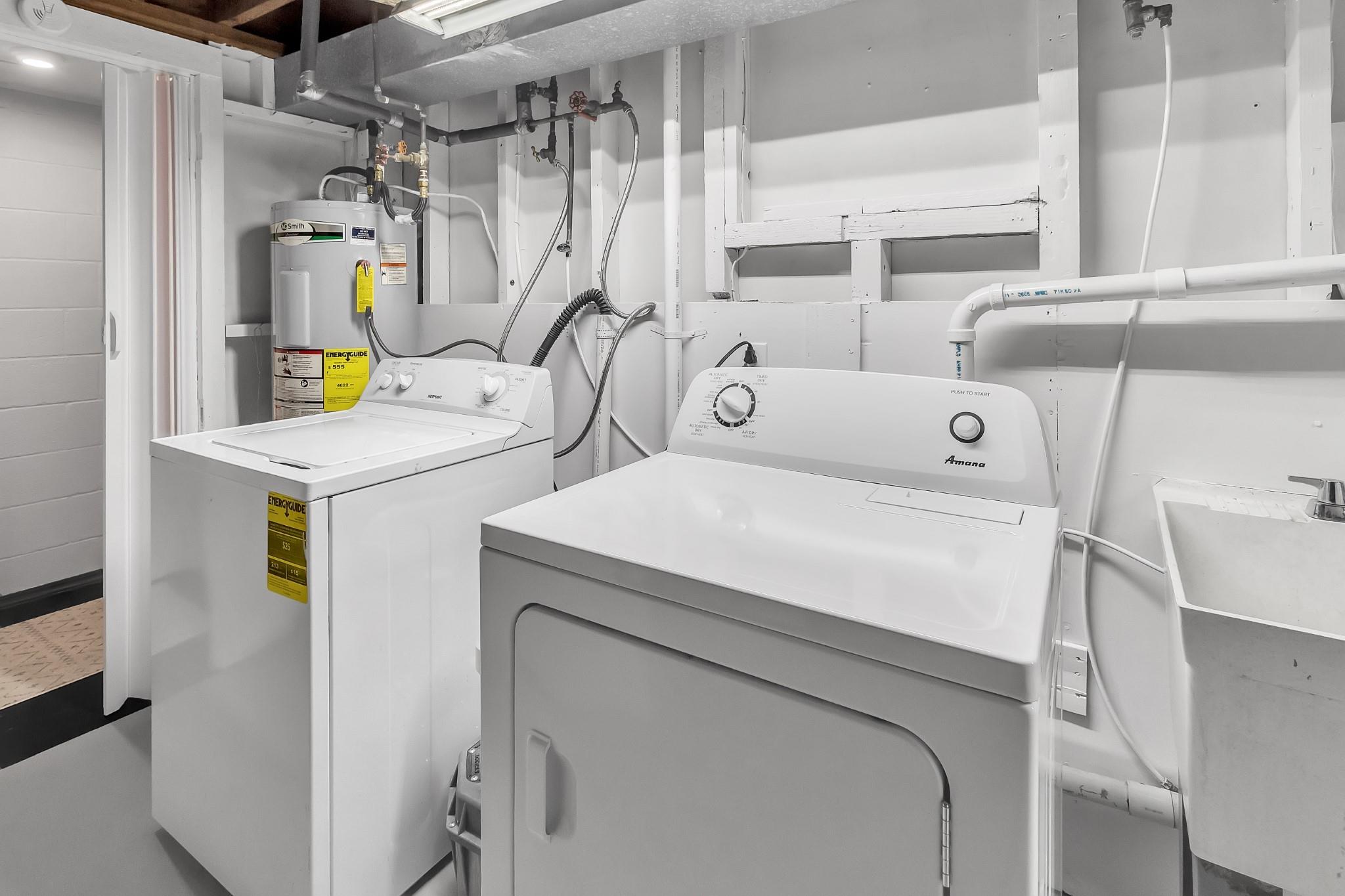 670 Thompson Cove Road Clyde, NC 28721 - Photo 19 of 45 a utility room with dryer and washer