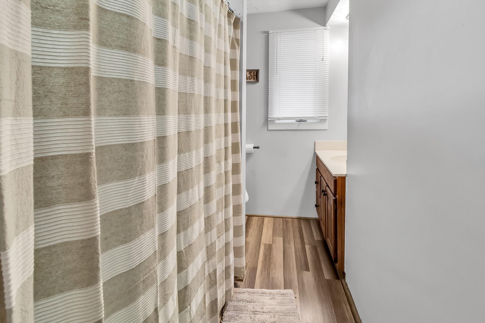 670 Thompson Cove Road Clyde, NC 28721 - Photo 26 of 45 a view of a bathroom from a corridor