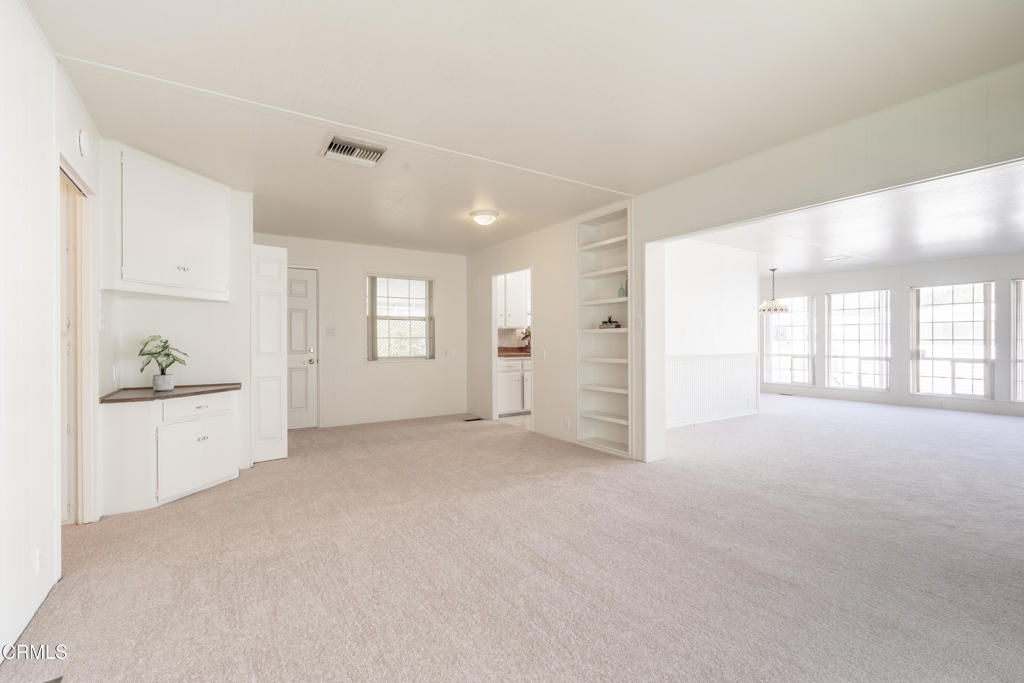 1202 Loma Drive, Unit 42 Ojai, CA 93023 - Photo 14 of 28 a view of an empty room with window and cabinet