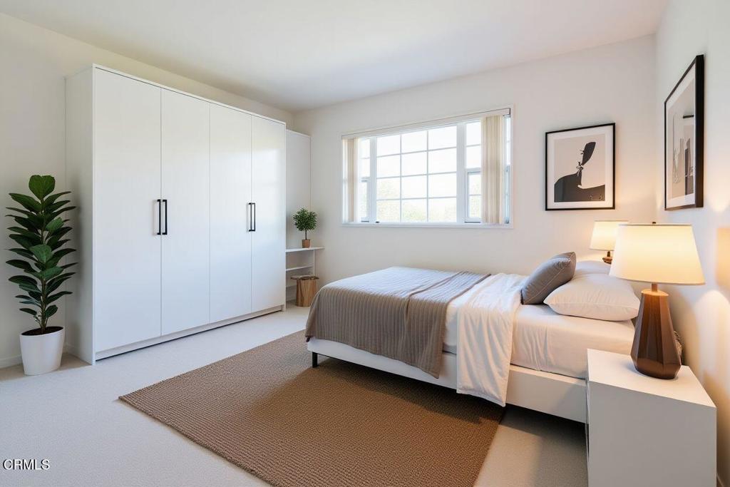 1202 Loma Drive, Unit 42 Ojai, CA 93023 - Photo 18 of 28 a bedroom with a bed and a potted plant