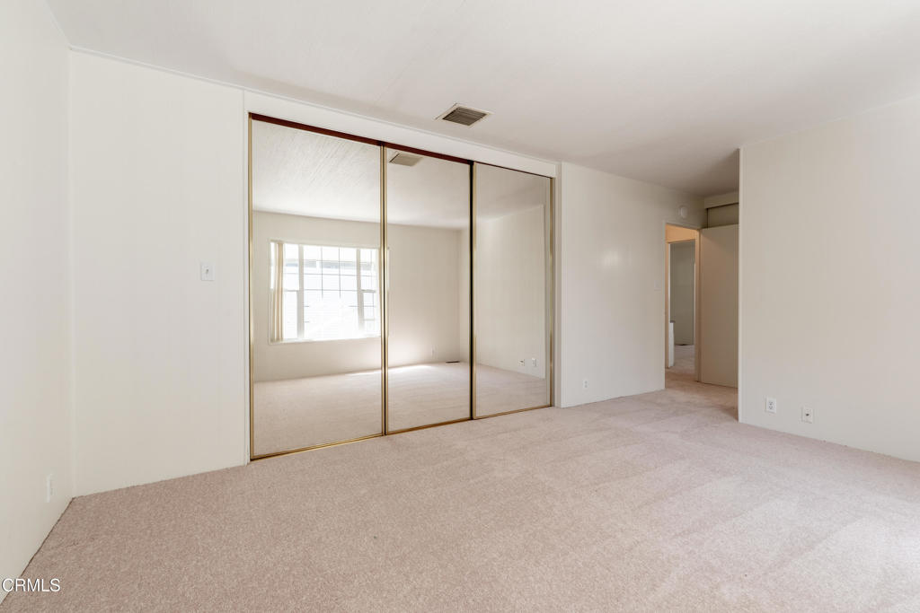 1202 Loma Drive, Unit 42 Ojai, CA 93023 - Photo 25 of 28 a view of an empty room with a window