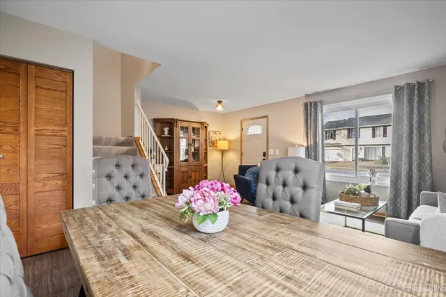 a bedroom with a bed and a table