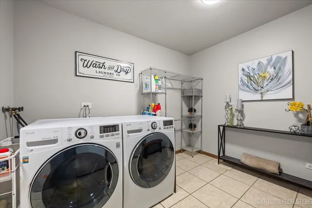 a view of livingroom with washer and dryer