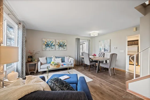 a living room with furniture and a table